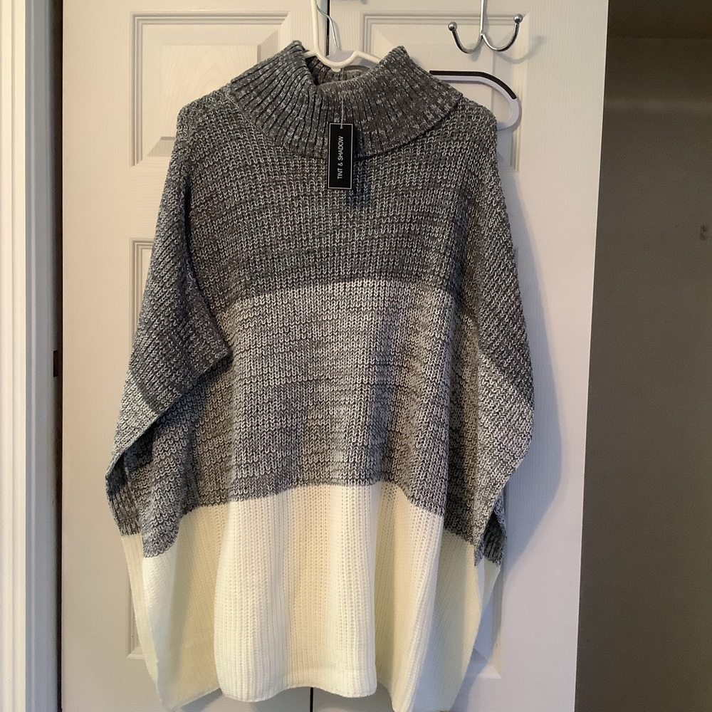 Never worn with tags grey and white poncho top. L/XL. Tint and Shadow brand.